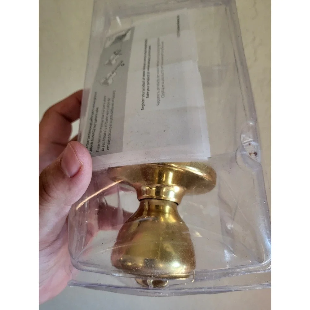 Kwikset Tylo Polished Brass Passage Hall/Closet Door Knob in Gold